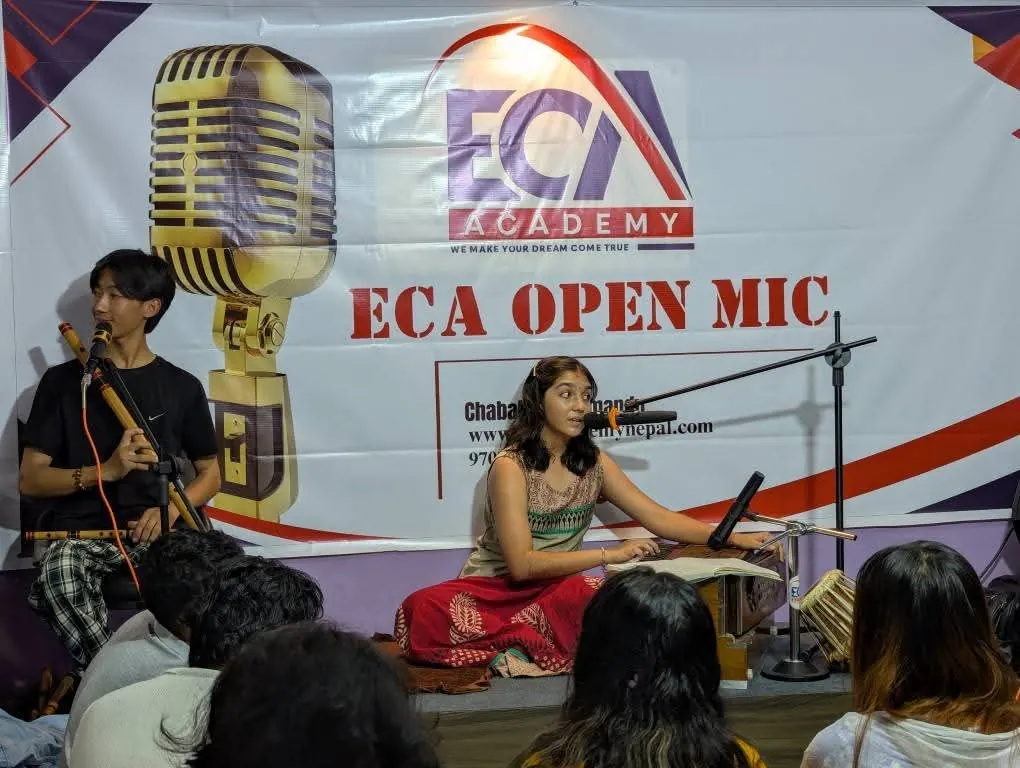 Students performing flute and vocals at ECA Open Mic