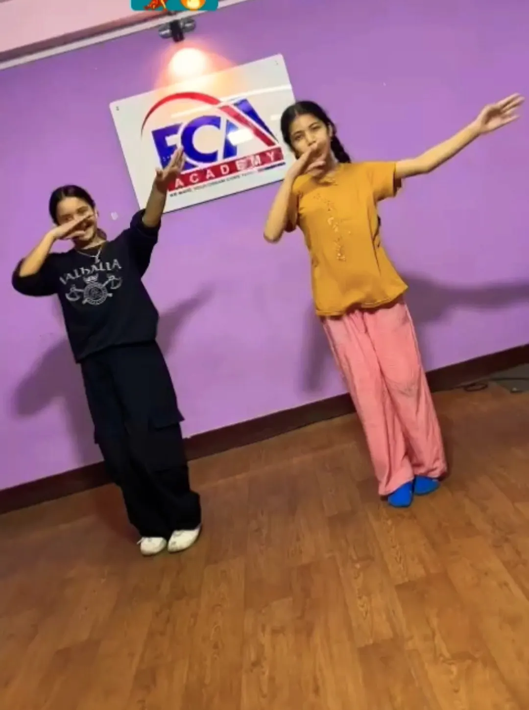 Students dancing in the ECA Academy hall