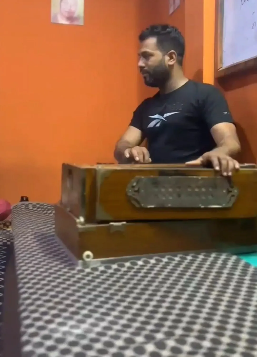 Guru Subash Chandra Joshi leading vocal riyaz on the harmonium