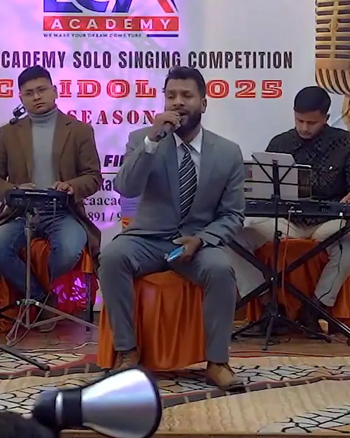 Subash Chandra Joshi singing on stage at the ECA Idol 2025 grand finale