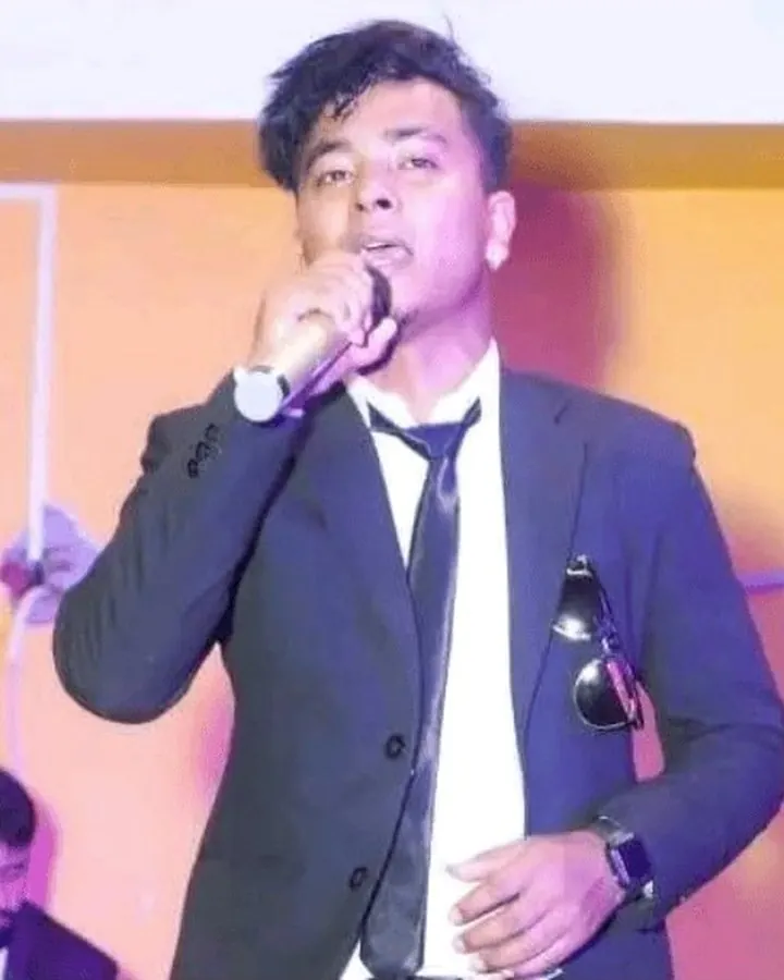 Tikaram Shrestha singing on stage
